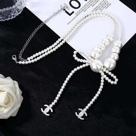 CHANEL 25S CHAIN BELT IN WHITE PEARL WITH BOW 614475 - 30