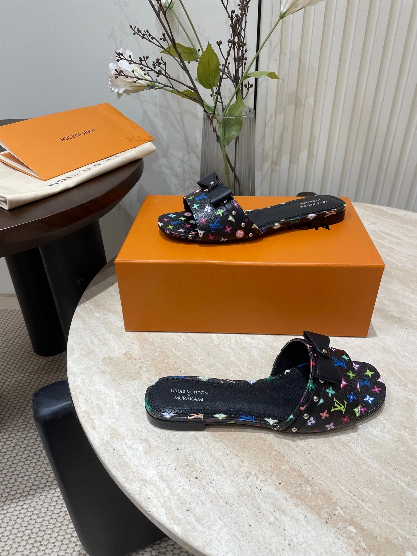 BOW FLAT MULES IN BLACK MONOGRAM LAMBSKIN - 35