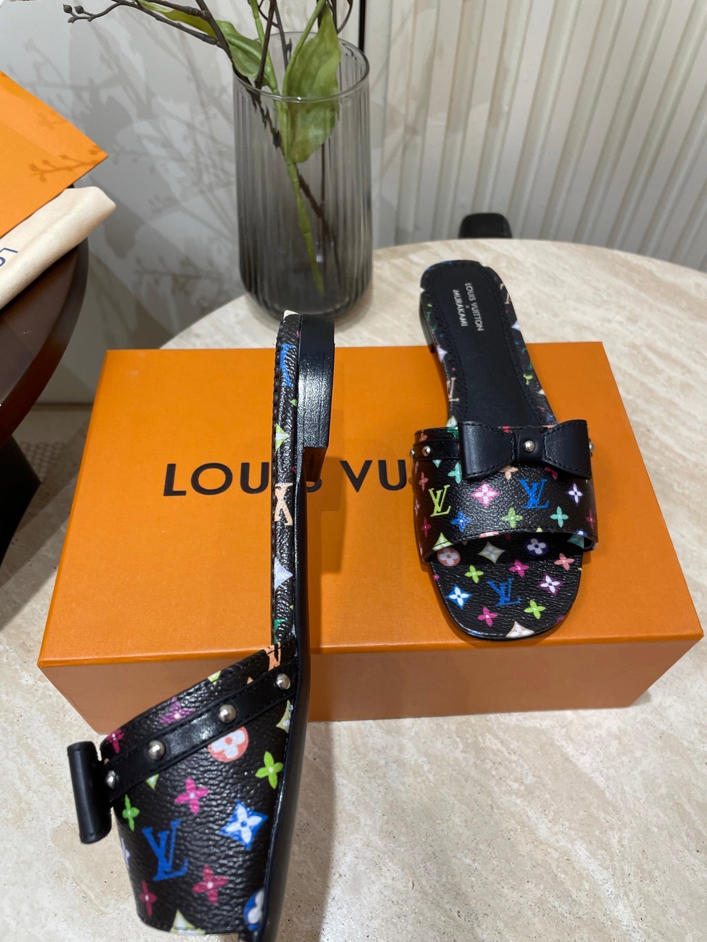 BOW FLAT MULES IN BLACK MONOGRAM LAMBSKIN - 35