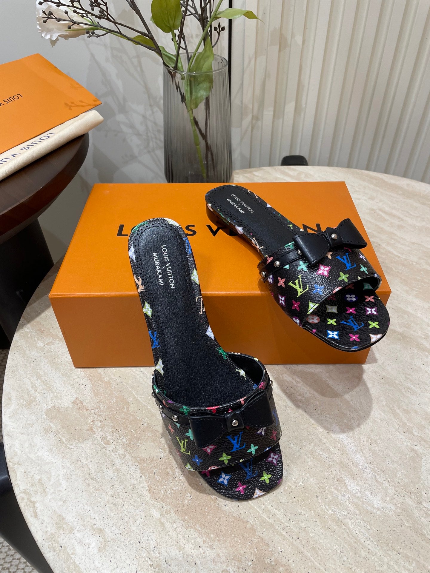 BOW FLAT MULES IN BLACK MONOGRAM LAMBSKIN - 35