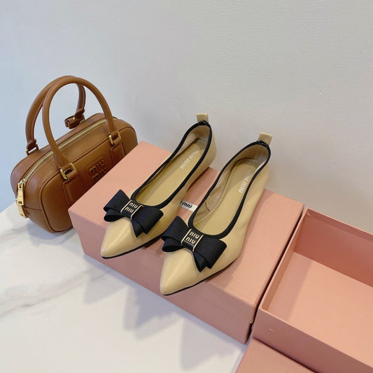 Балетки MIUMIU 26S з телячої шкіри бежевого кольору з бантом