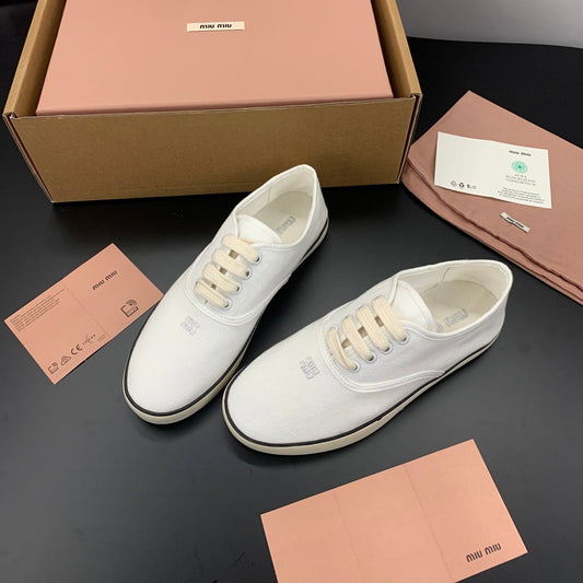 КРОСІВКИ MIUMIU 26S НА ШНУРІВЦІ З БІЛОГО ПОЛОТНА НА ГУМОВІЙ ПІДОШВІ