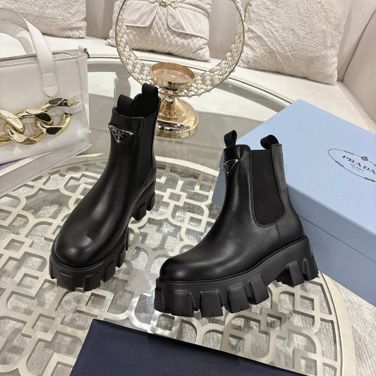 Черевики PRADA 26S MONOLITH CHELSEA З ЧОРНОЇ БЛИСКУЧОЇ ТЕЛЯЧОЇ ШКІРИ ТА ТЕКСТИЛЮ