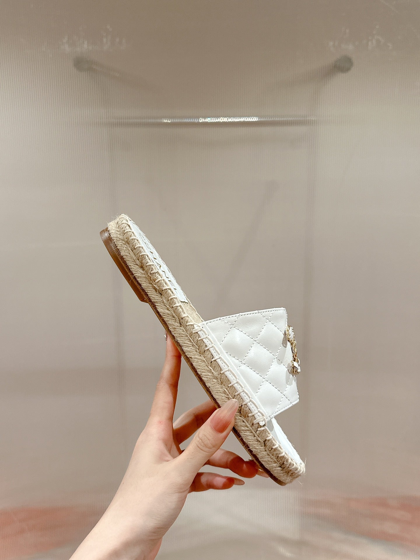 FLAT SLIPPERS IN WHITE LAMBSKIN AND WOVEN WITH LOGO - 35