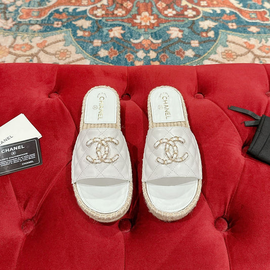 FLAT SLIPPERS IN WHITE LAMBSKIN AND WOVEN WITH LOGO - 35