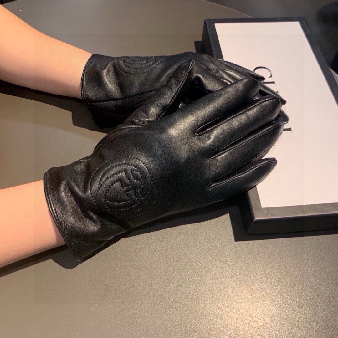 GLOVES WITH EMBROIDERY DESIGN IN BLACK LAMBSKIN AND WOOL LINING 407774 - M