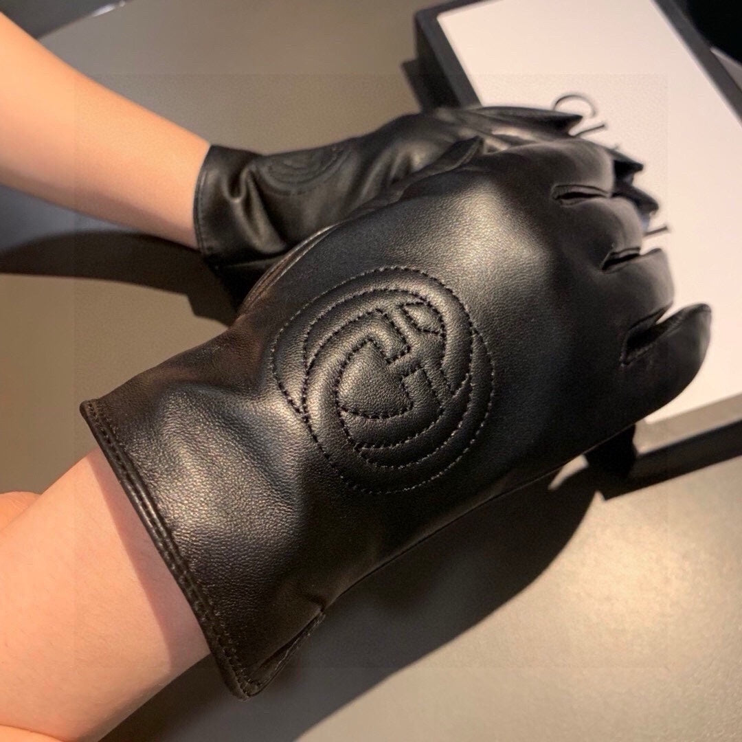 GLOVES WITH EMBROIDERY DESIGN IN BLACK LAMBSKIN AND WOOL LINING 407774 - M