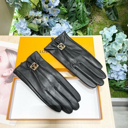 LV GLOVES IN BLACK LAMBSKIN WITH GOLD LOGO 462422 - M