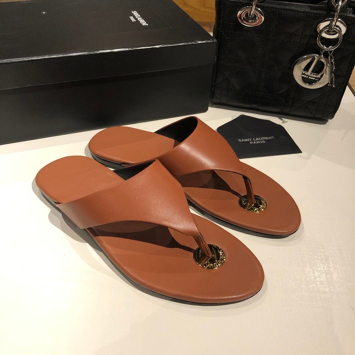 FLAT THONG IN BRONZE BROWN CALFSKIN - 35