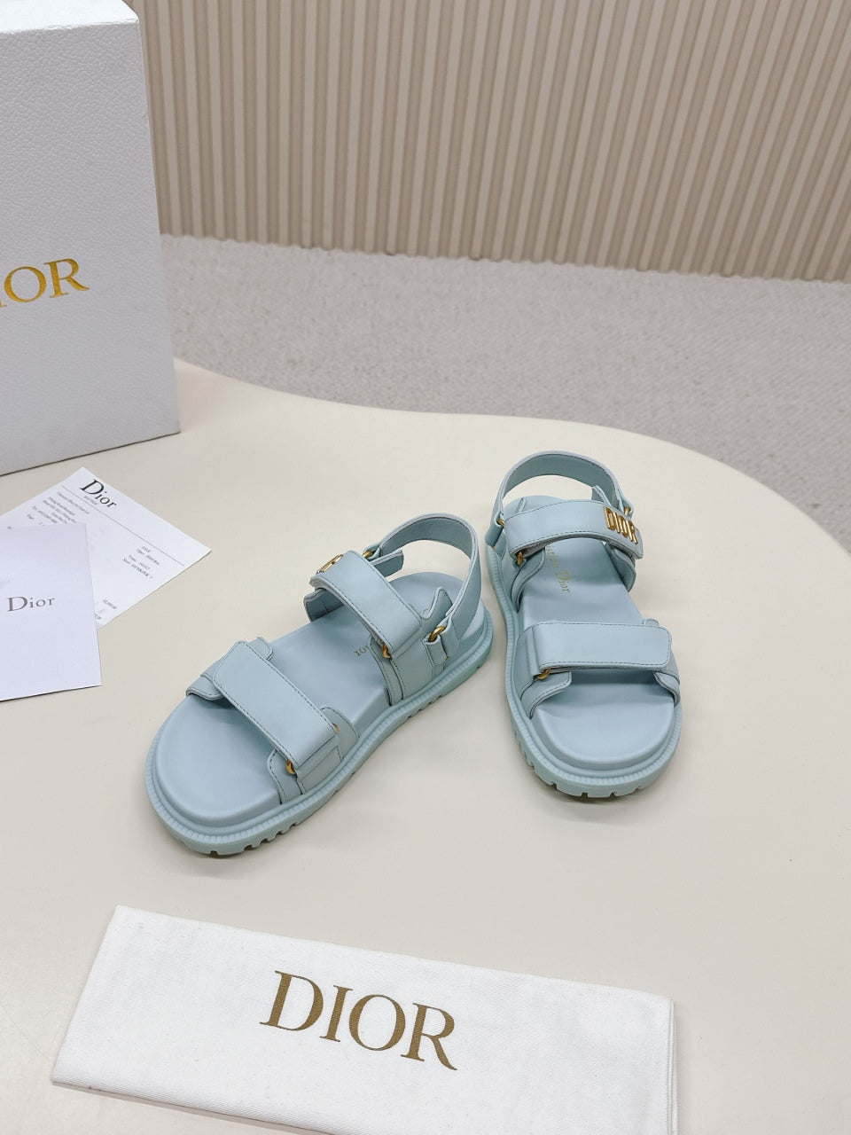 DIOR BACK-STRAP SANDALS 25S IN PASTEL BLUE CALFSKIN WITH GOLD HARDWARE - 35