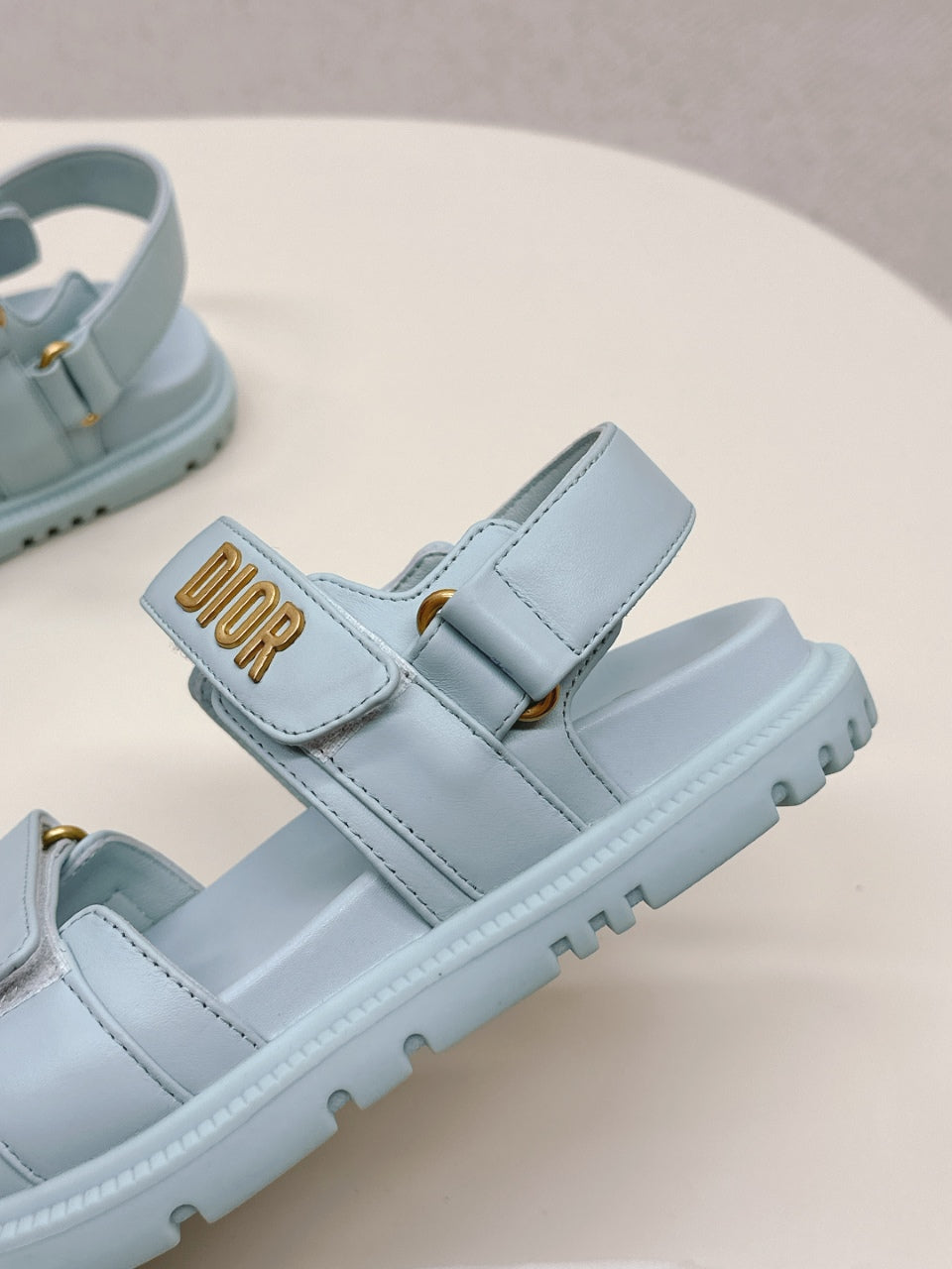 DIOR BACK-STRAP SANDALS 25S IN PASTEL BLUE CALFSKIN WITH GOLD HARDWARE - 35