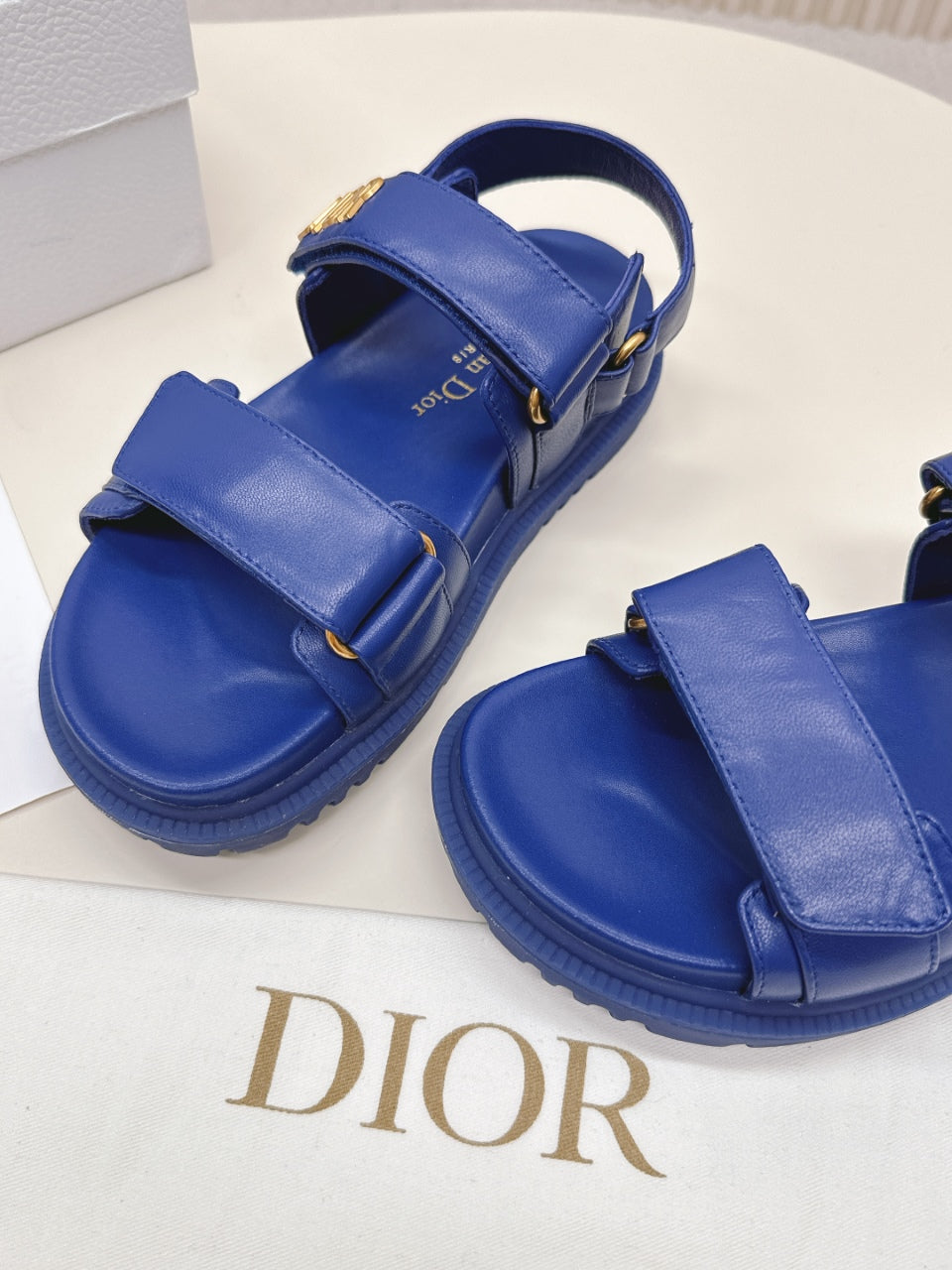 DIOR BACK-STRAP SANDALS 25S IN NAVY BLUE CALFSKIN WITH GOLD HARDWARE - 35