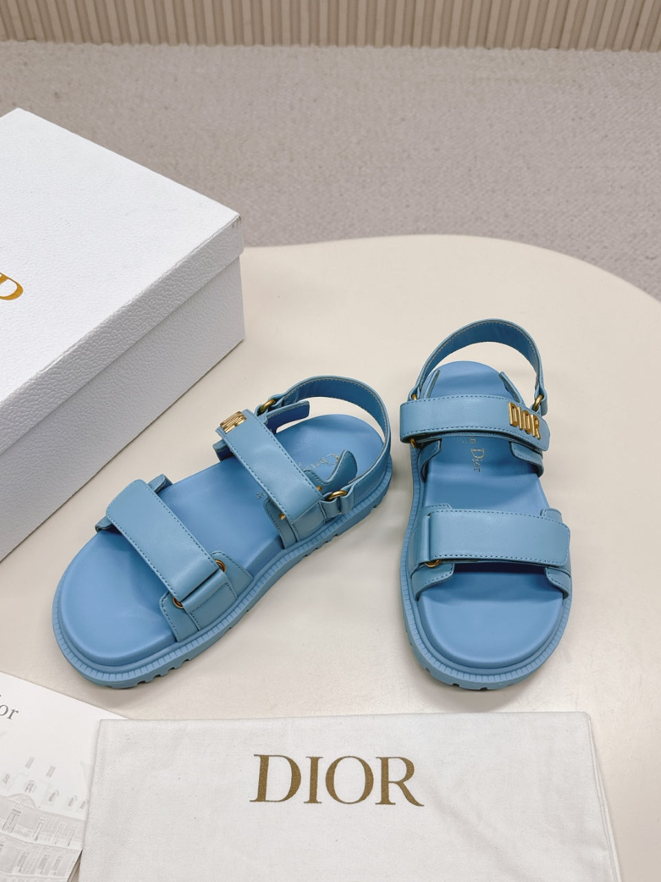 DIOR BACK-STRAP SANDALS 25S IN OCEAN BLUE CALFSKIN WITH GOLD HARDWARE - 35