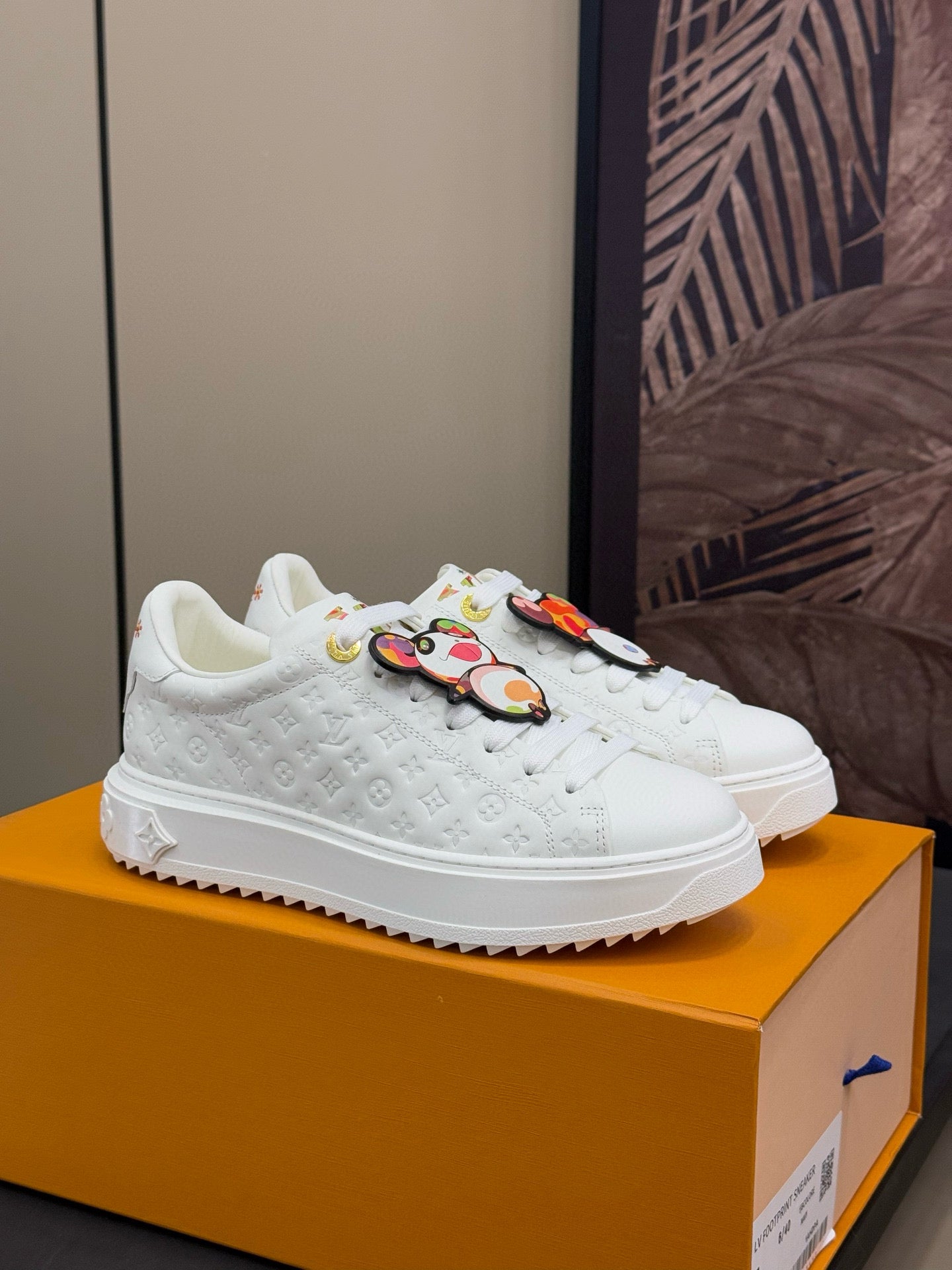 TIME OUT SNEAKER IN WHITE EMBOSSED MONOGRAM CALFSKIN - 35