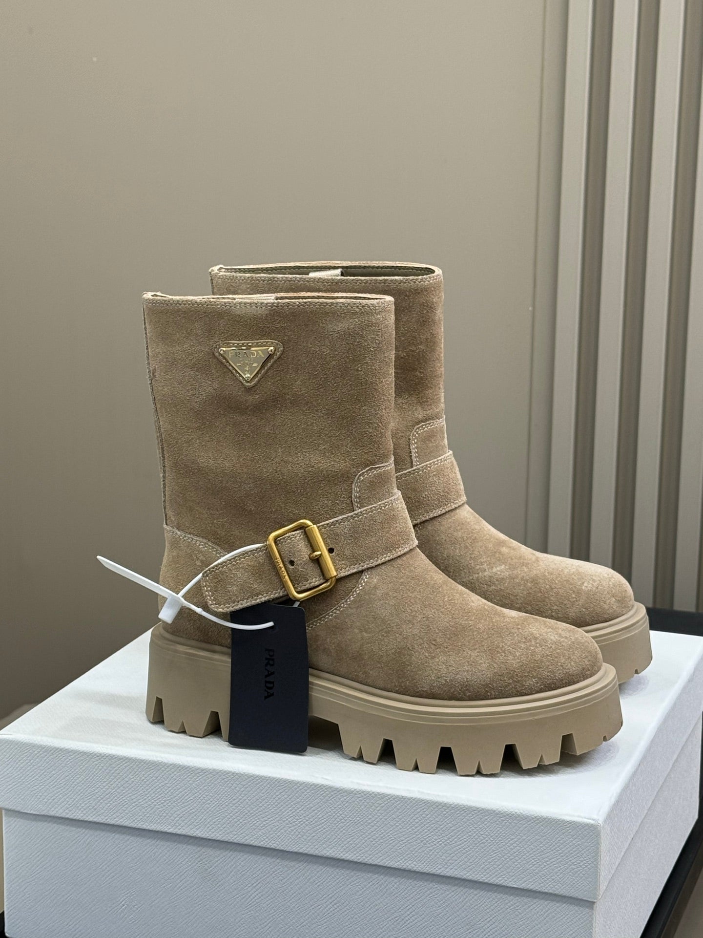 PRADA 25S PLATFORM ANKLE BOOTS IN DARK BEIGE SUEDE WITH GOLD HARDWARE - 35