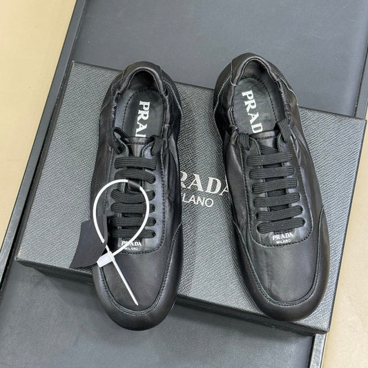 PRADA 25S COLLAPSE FLAT SHOES IN BLACK CALFSKIN - 35