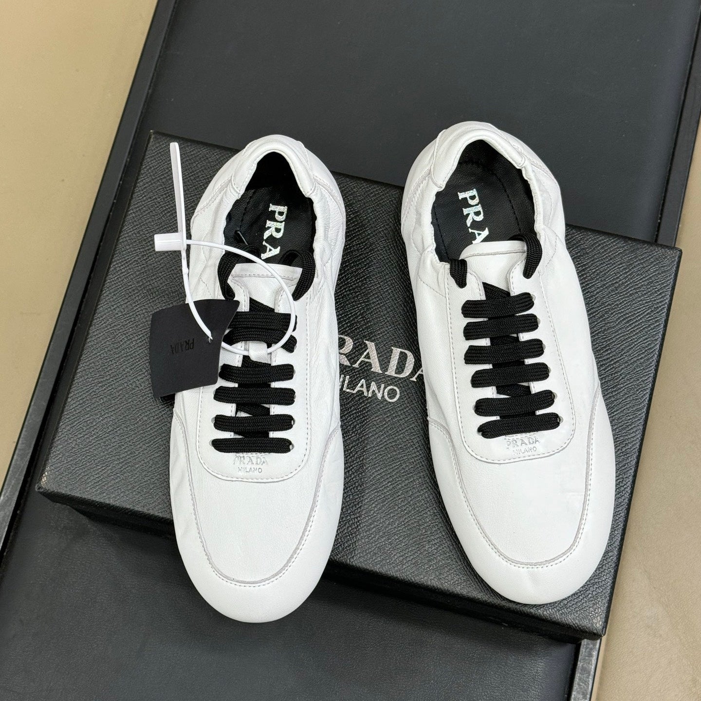 PRADA 25S COLLAPSE FLAT SHOES IN WHITE CALFSKIN - 35