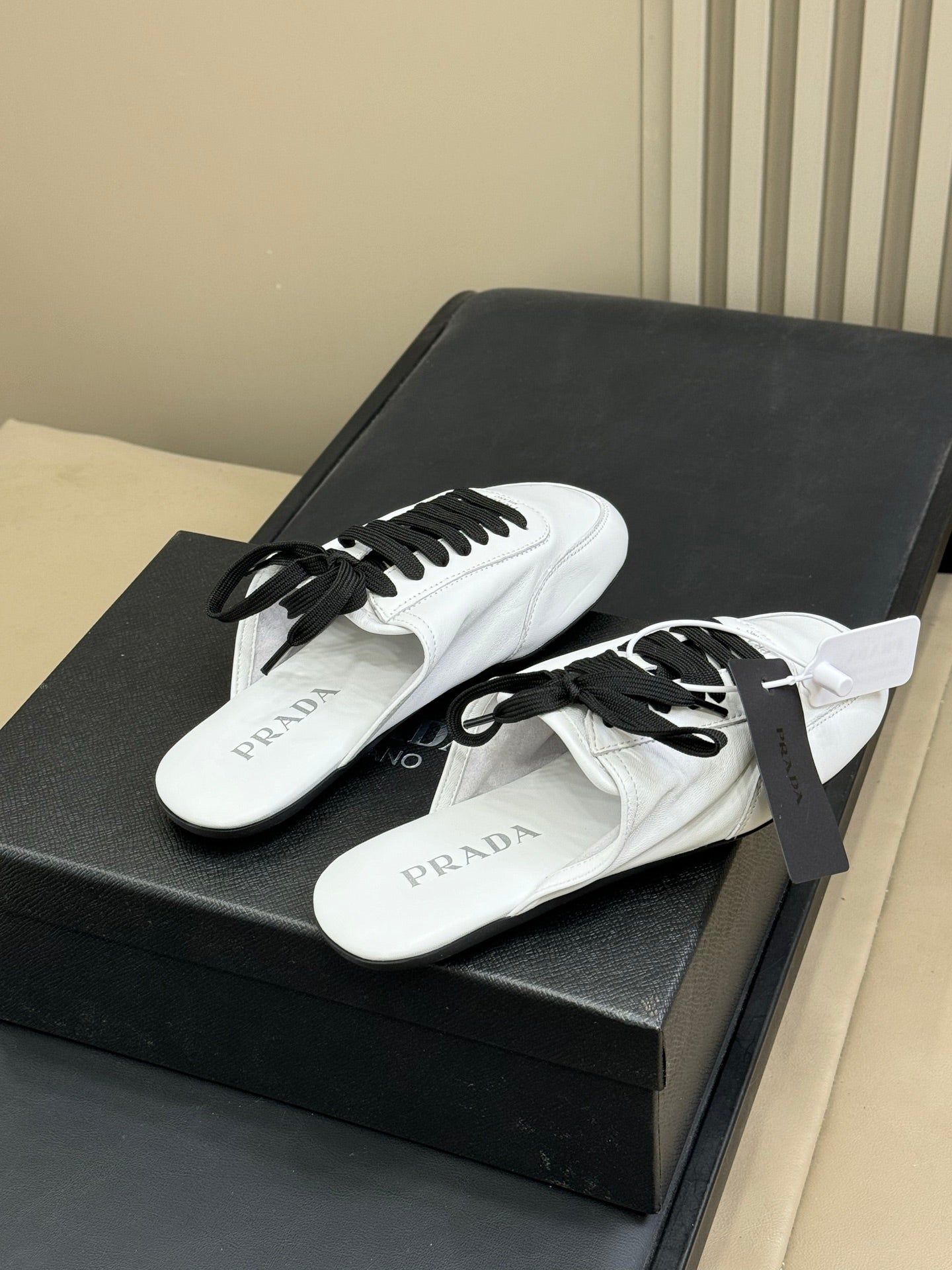 PRADA 25S COLLAPSE MULES IN WHITE CALFSKIN - 35