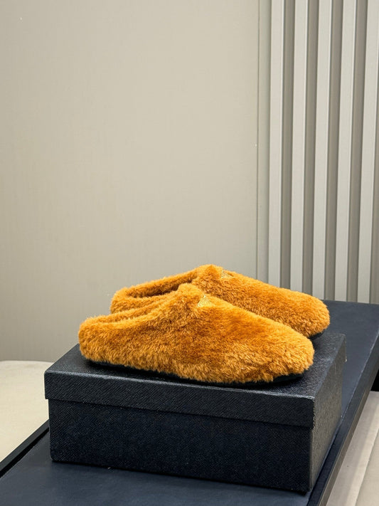 PRADA 25S CLOGS IN DARK ORANGE SHEARLING - 35