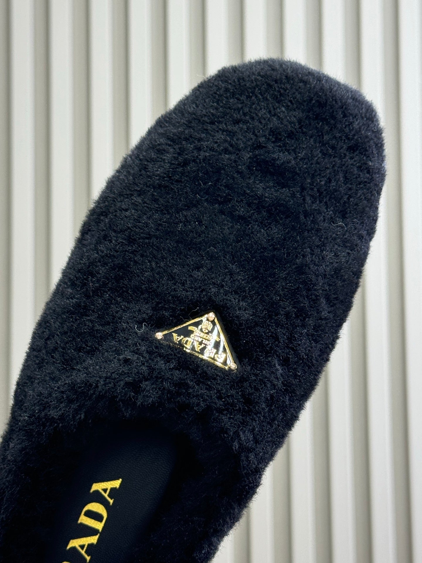 PRADA 25S CLOGS IN BLACK SHEARLING - 35