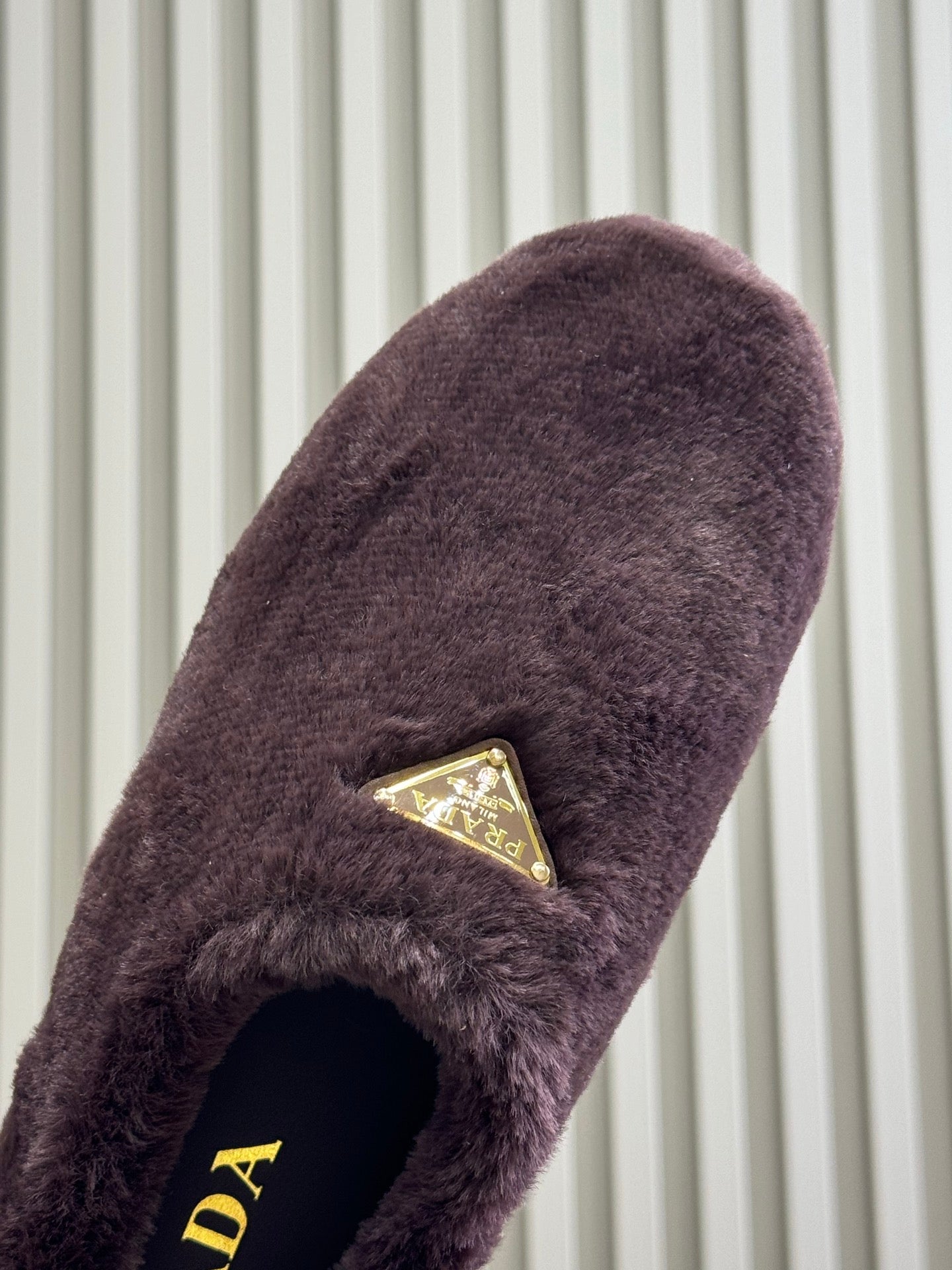PRADA 25S CLOGS IN WINE RED SHEARLING - 35