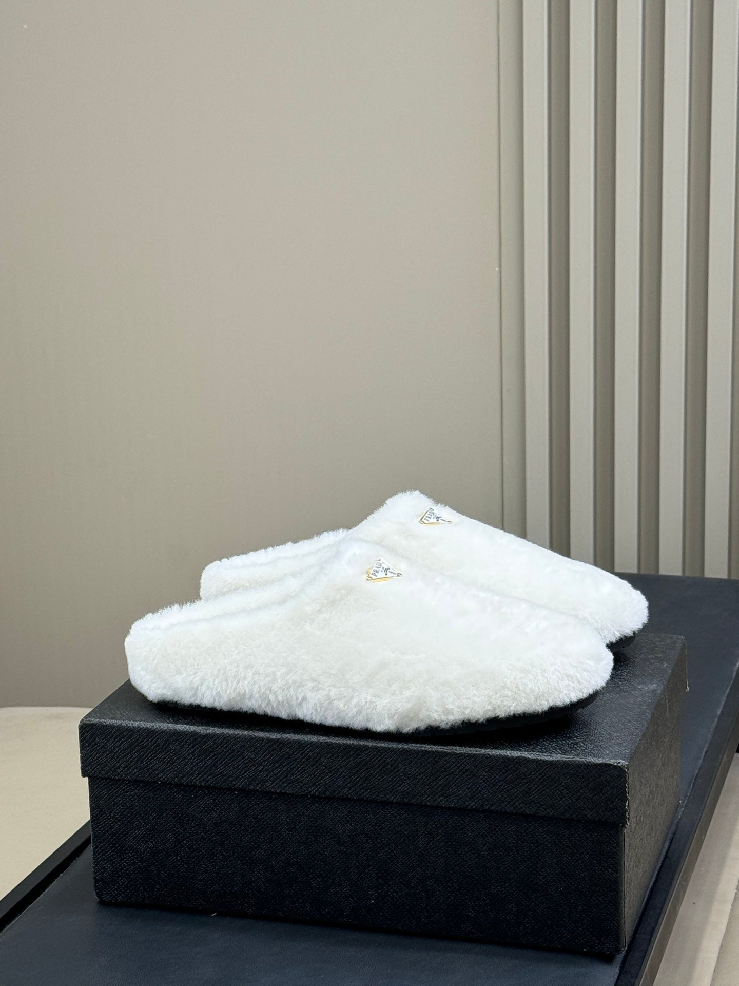 PRADA 25S CLOGS IN WHITE SHEARLING - 35