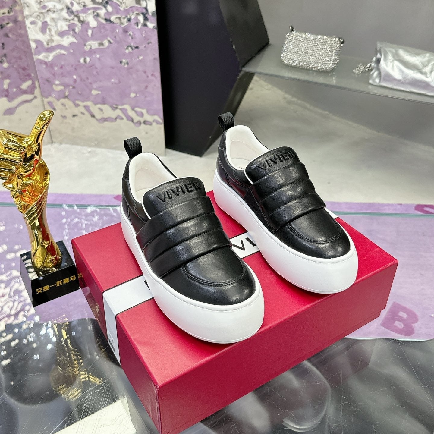 PUFFY LEATHER LOW TOP SNEAKERS IN BLACK LAMBSKIN - 34
