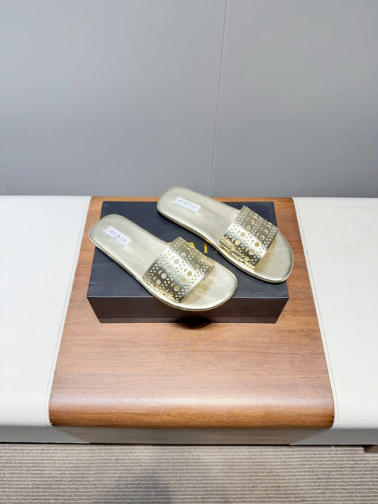 ALAIA FLAT SANDALS WITH PERFORATED STRAPS 25S IN GOLD LAMBSKIN - 35
