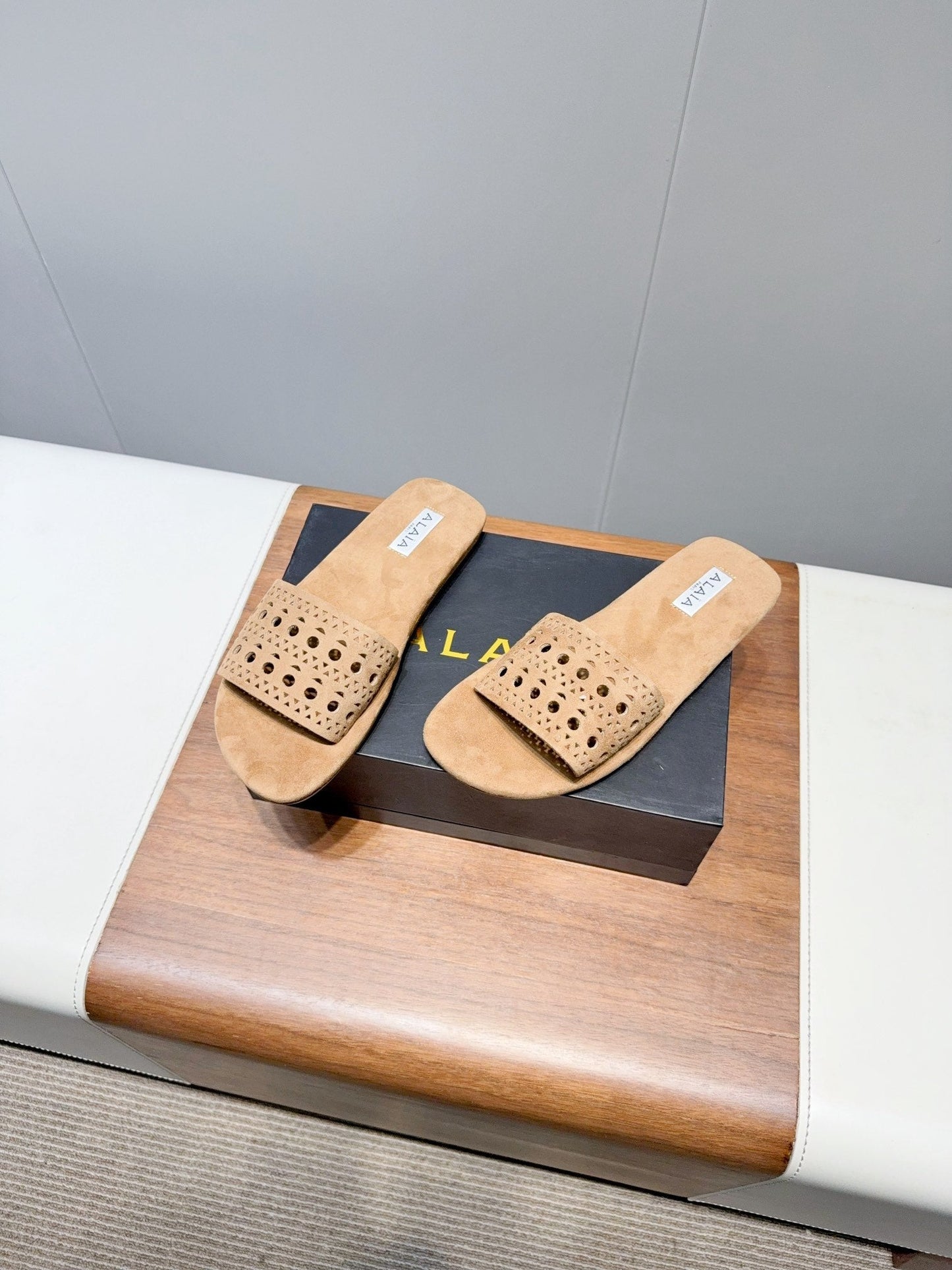 ALAIA FLAT SANDALS WITH PERFORATED STRAPS 25S IN BEIGE SUEDE - 35