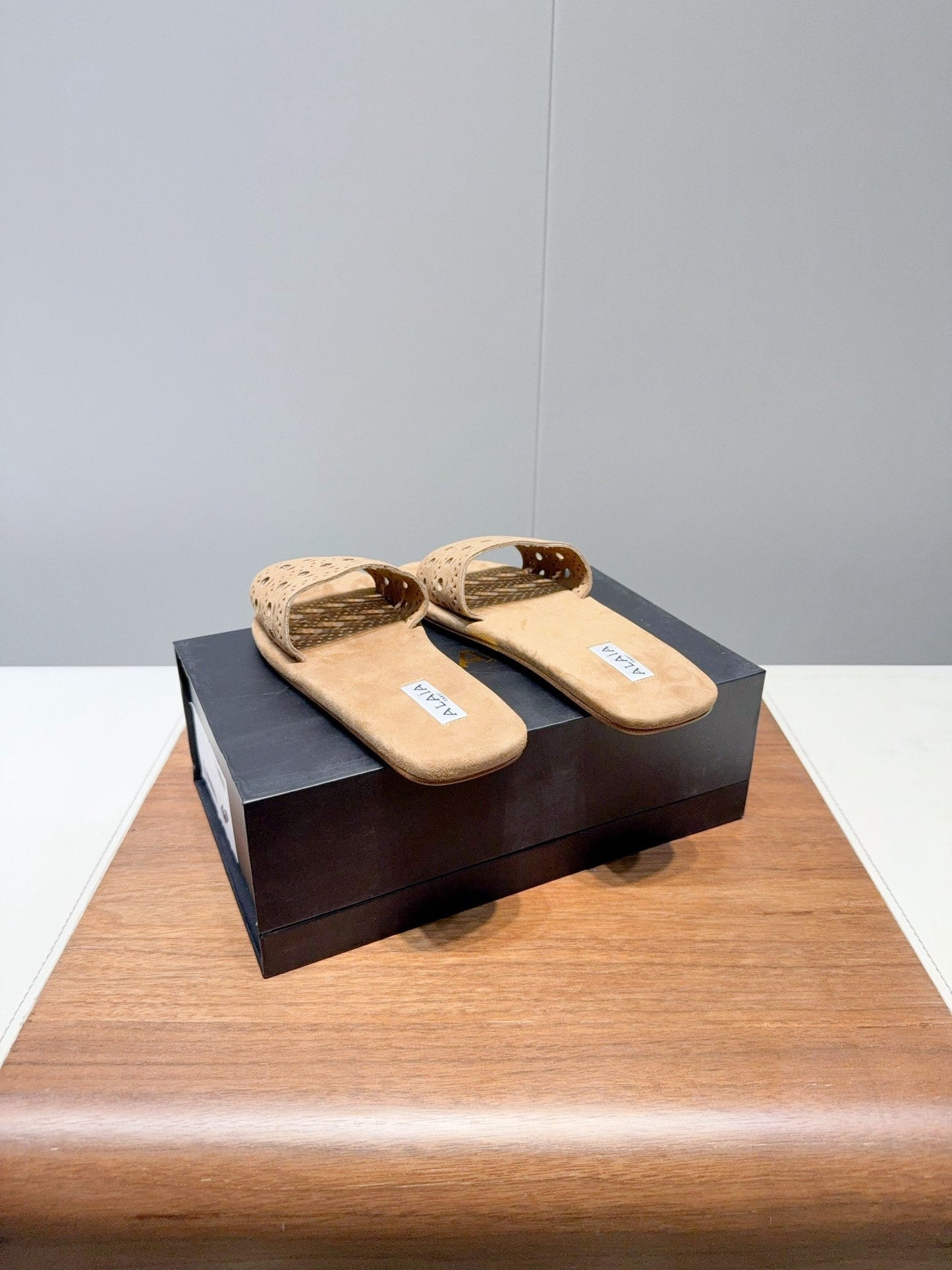 ALAIA FLAT SANDALS WITH PERFORATED STRAPS 25S IN BEIGE SUEDE - 35
