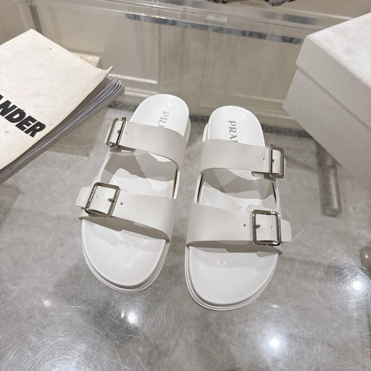 ШЛЬОПАНЦІ PRADA 26S З БІЛОЇ ТЕЛЯЧОЇ ШКІРИ, СРІБНА ФУРНІТУРА