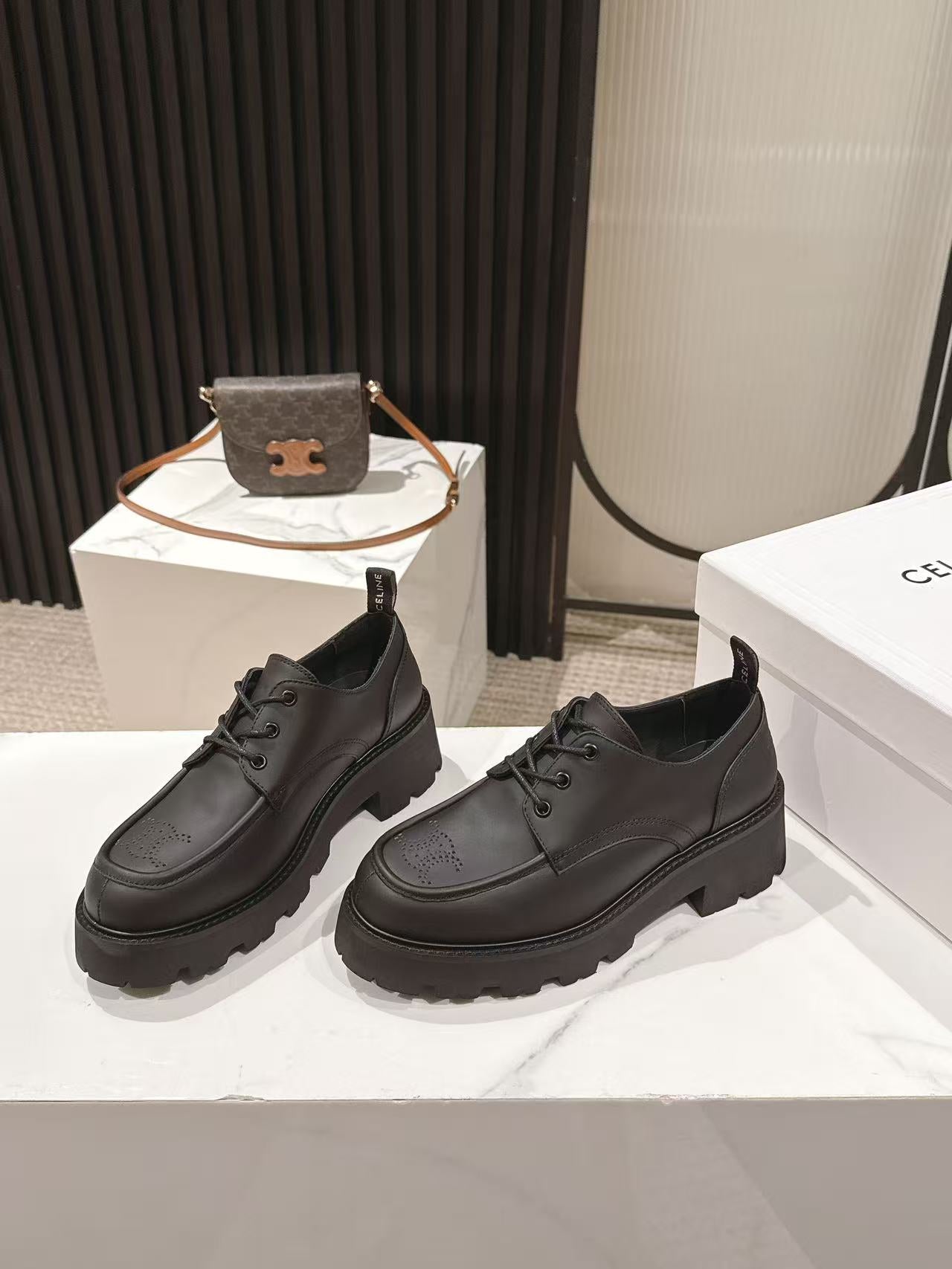 CELINE 25S THICK SOLED LOAFERS 50MM IN BLACK CALFSKIN - 35