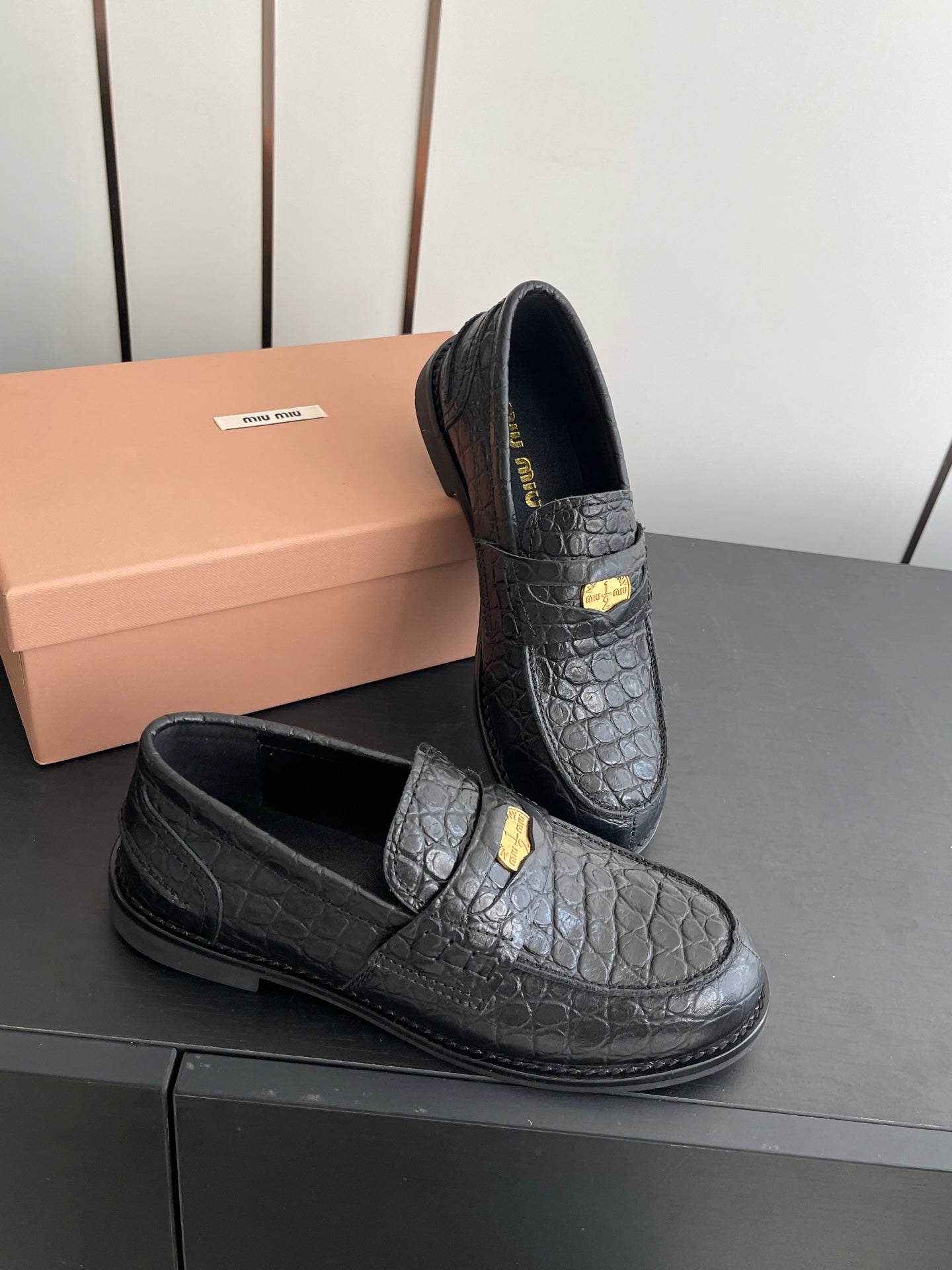 MIUMIU 26S PENNY LOAFERS IN BLACK CALFSKIN CROCODILE EMBOSSING