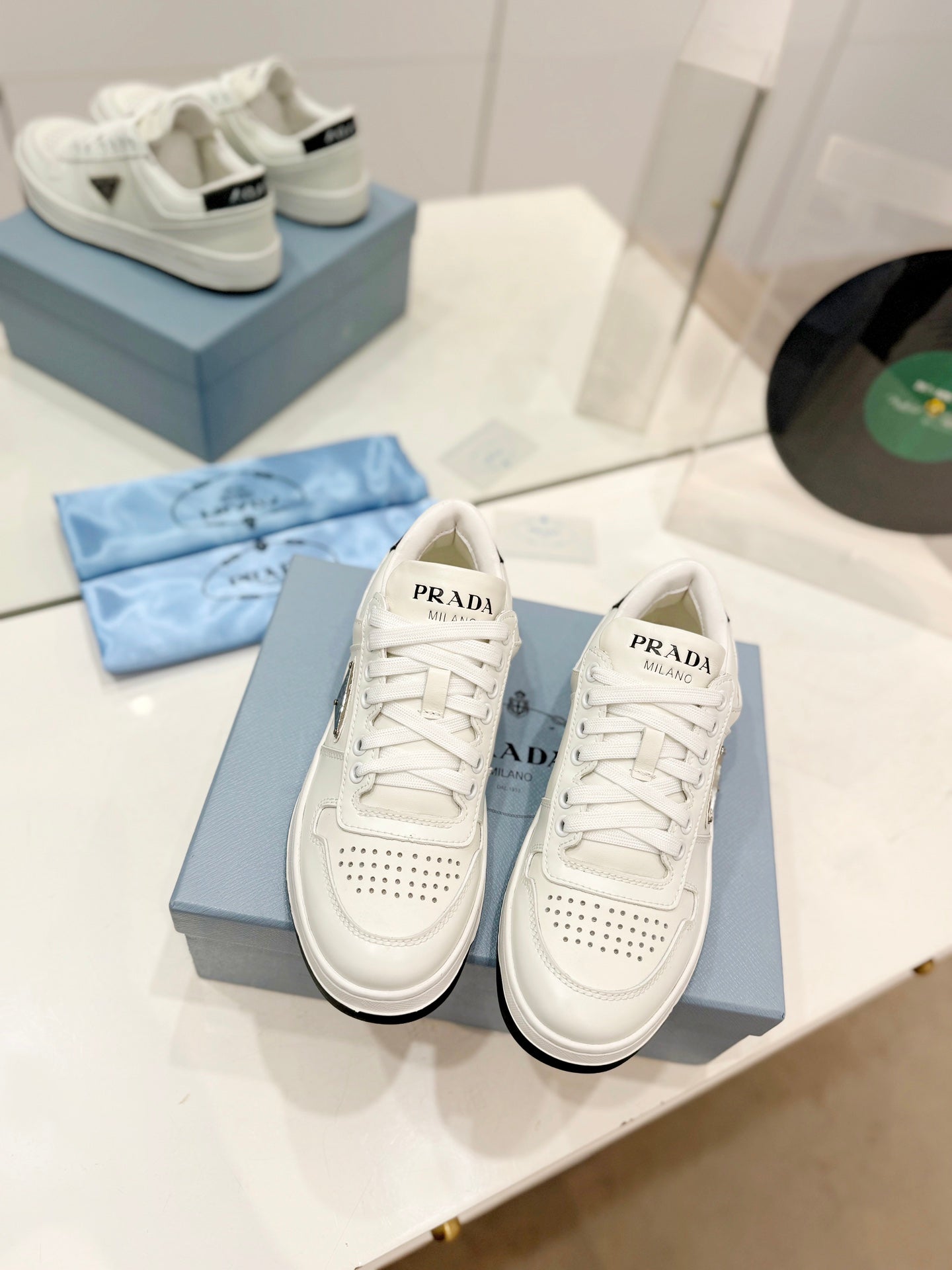 PRA DOWNTOWN PERFORATED SNEAKERS WHITE AND BLACK LOGO CALFSKIN - 35