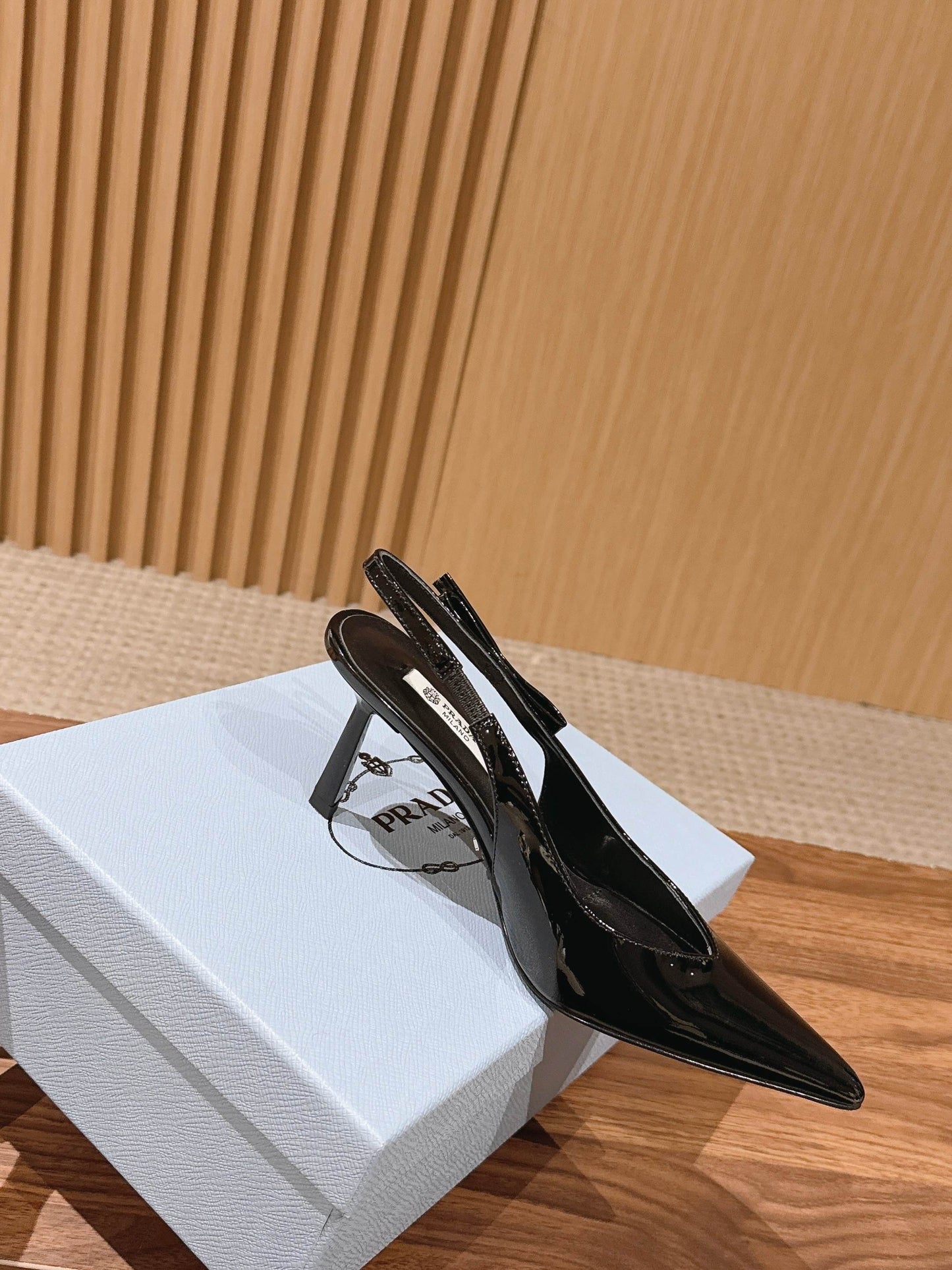 PRADA 26S SLINGBACK PUMPS IN BLACK PATENT CALFSKIN