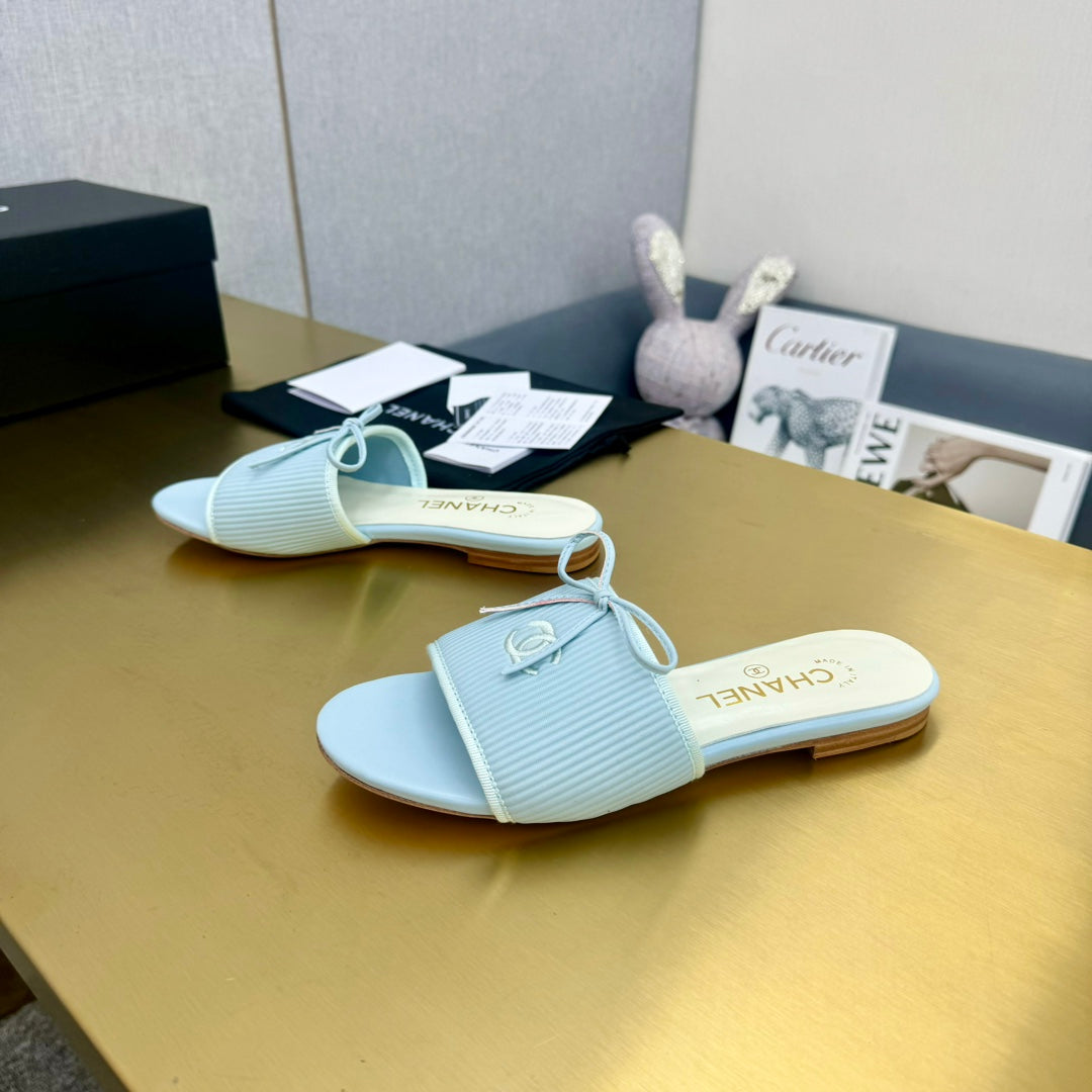 BOW SLIPPERS IN LIGHT BLUE LAMBSKIN - 35