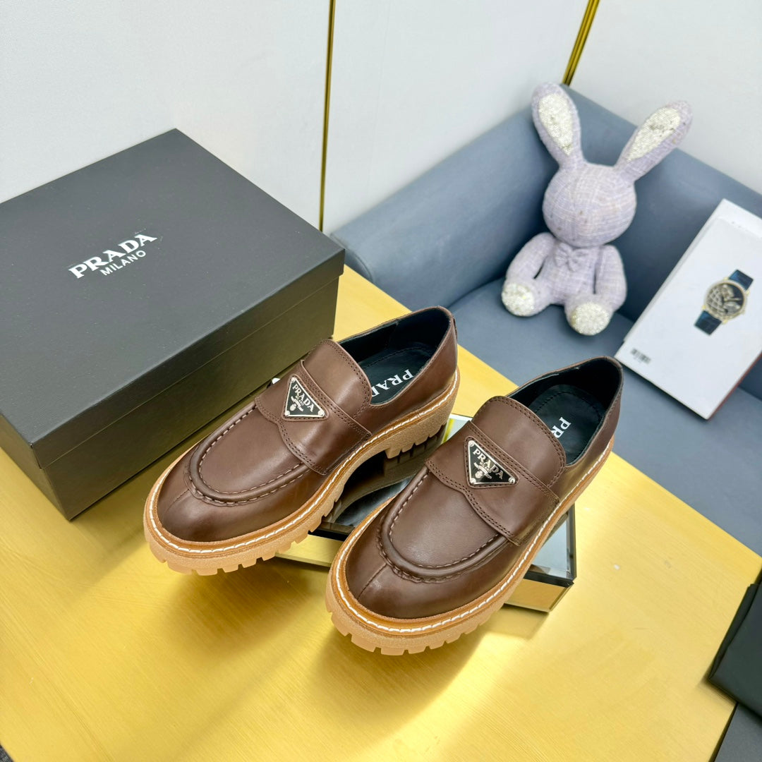 LOAFER WITH TRIANGLE LOGO IN CHOCOLATE BROWN CALFSKIN - 35