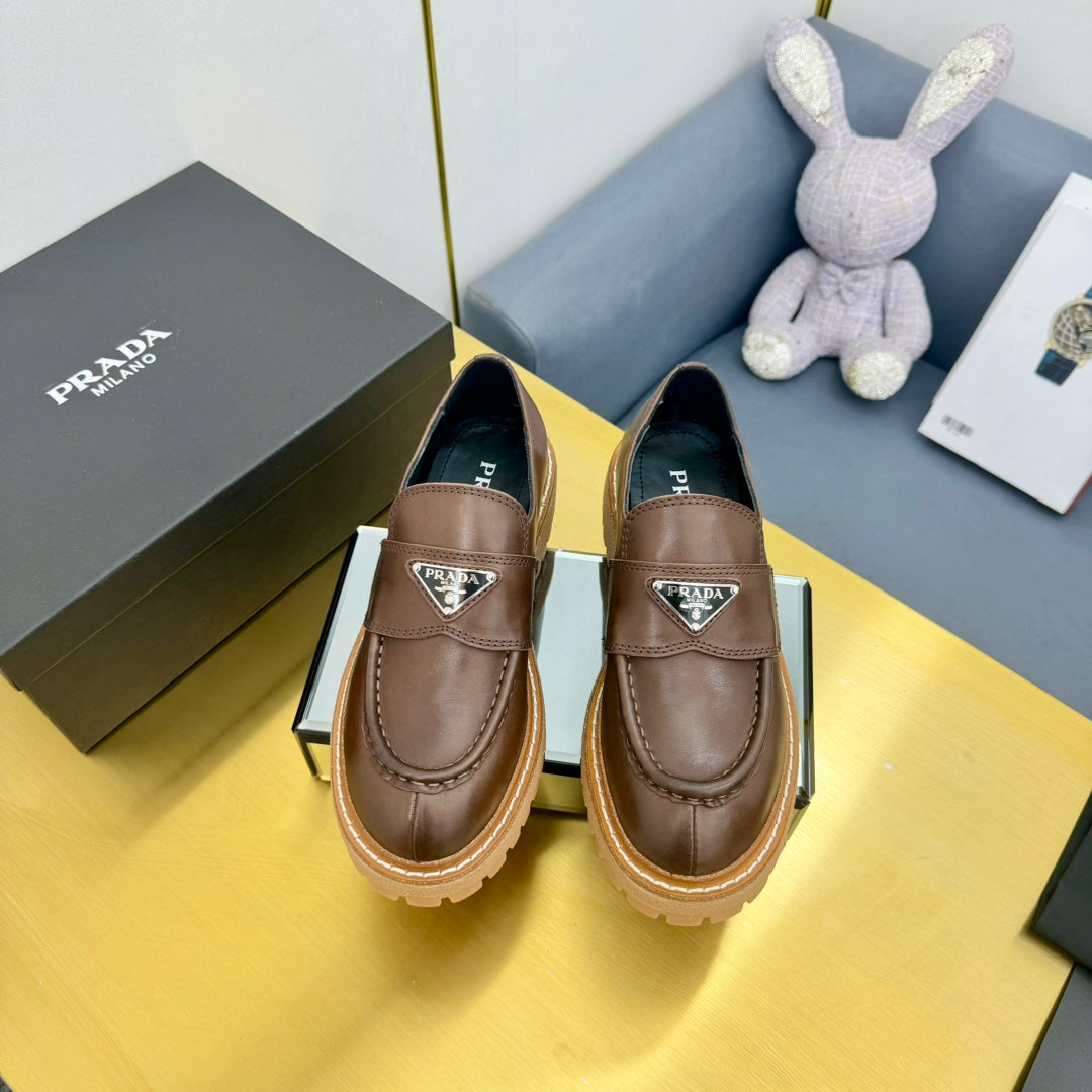 LOAFER WITH TRIANGLE LOGO IN CHOCOLATE BROWN CALFSKIN - 35
