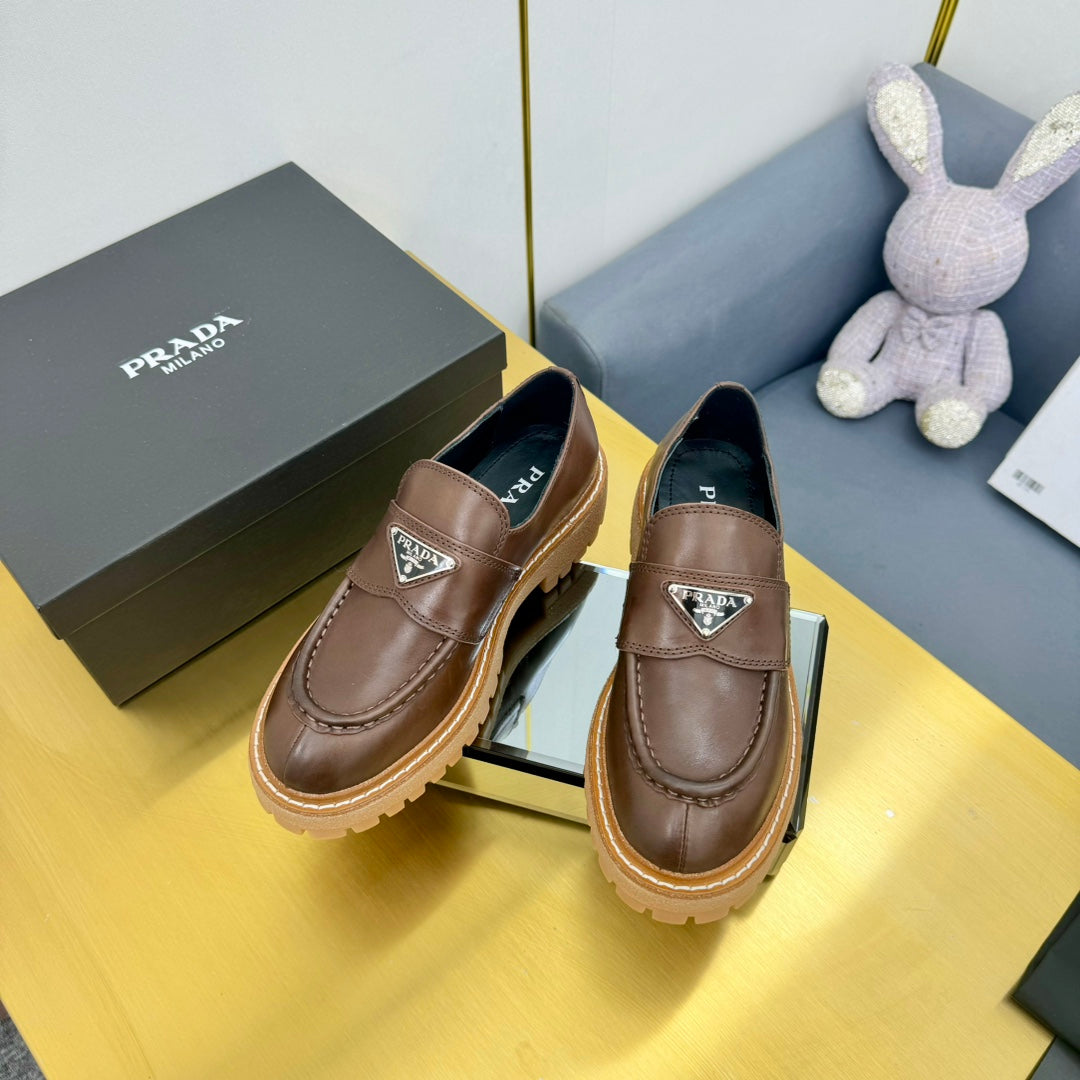 LOAFER WITH TRIANGLE LOGO IN CHOCOLATE BROWN CALFSKIN - 35