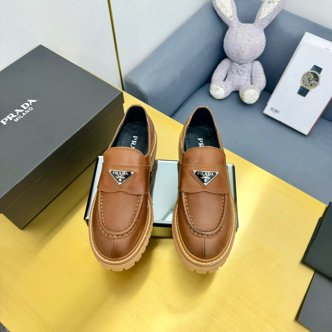 LOAFER WITH TRIANGLE LOGO IN COGNAC CALFSKIN - 35