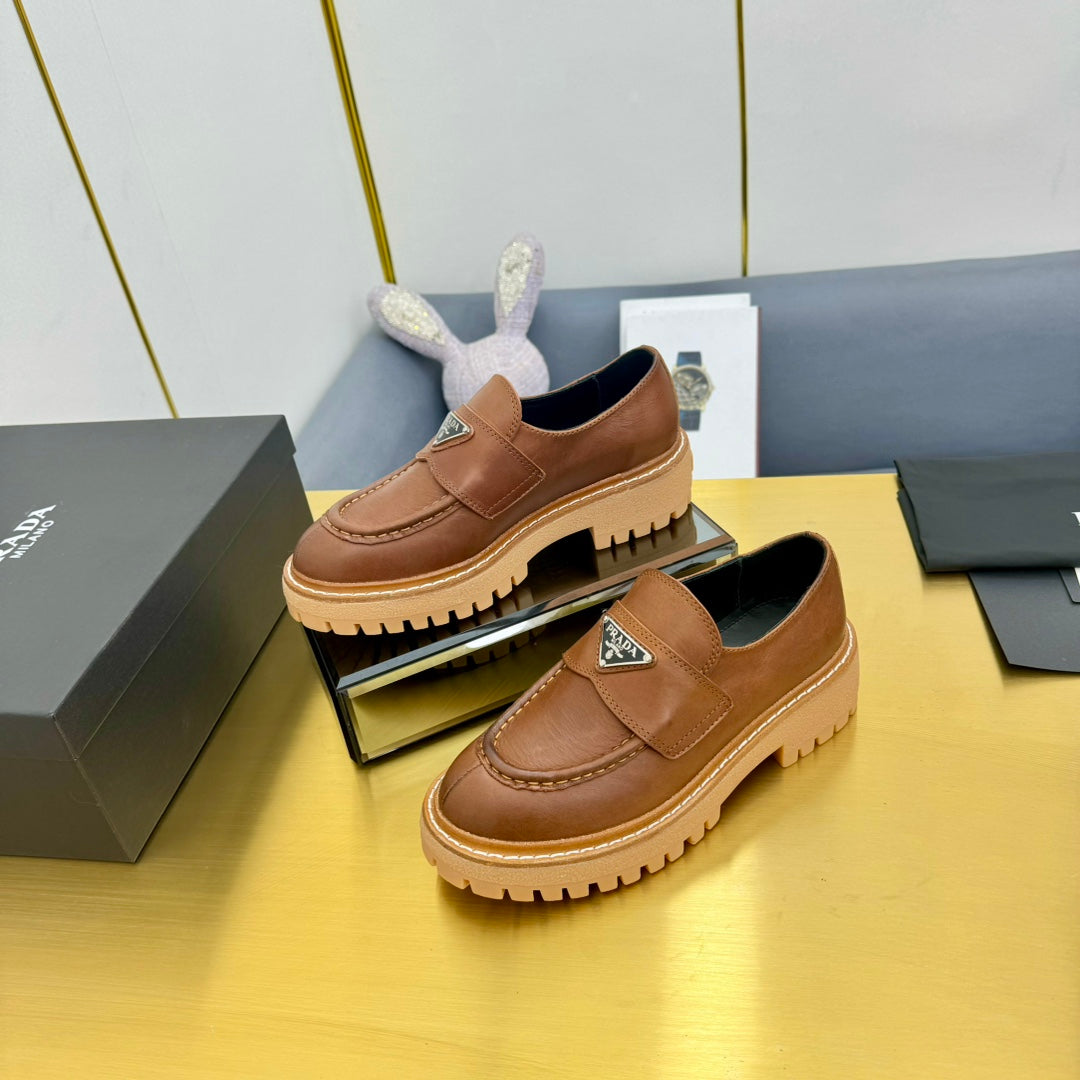 LOAFER WITH TRIANGLE LOGO IN COGNAC CALFSKIN - 35