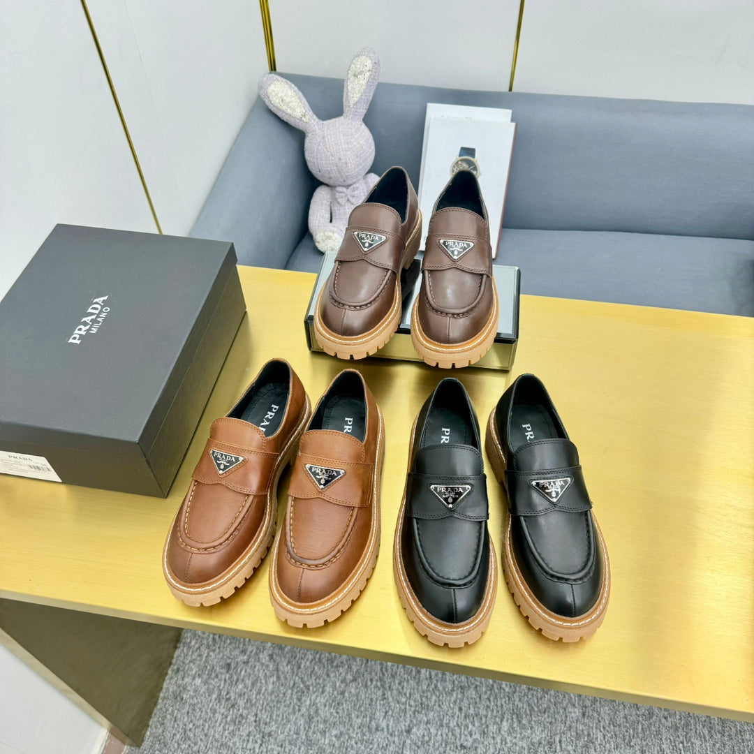 LOAFER WITH TRIANGLE LOGO IN COGNAC CALFSKIN - 35