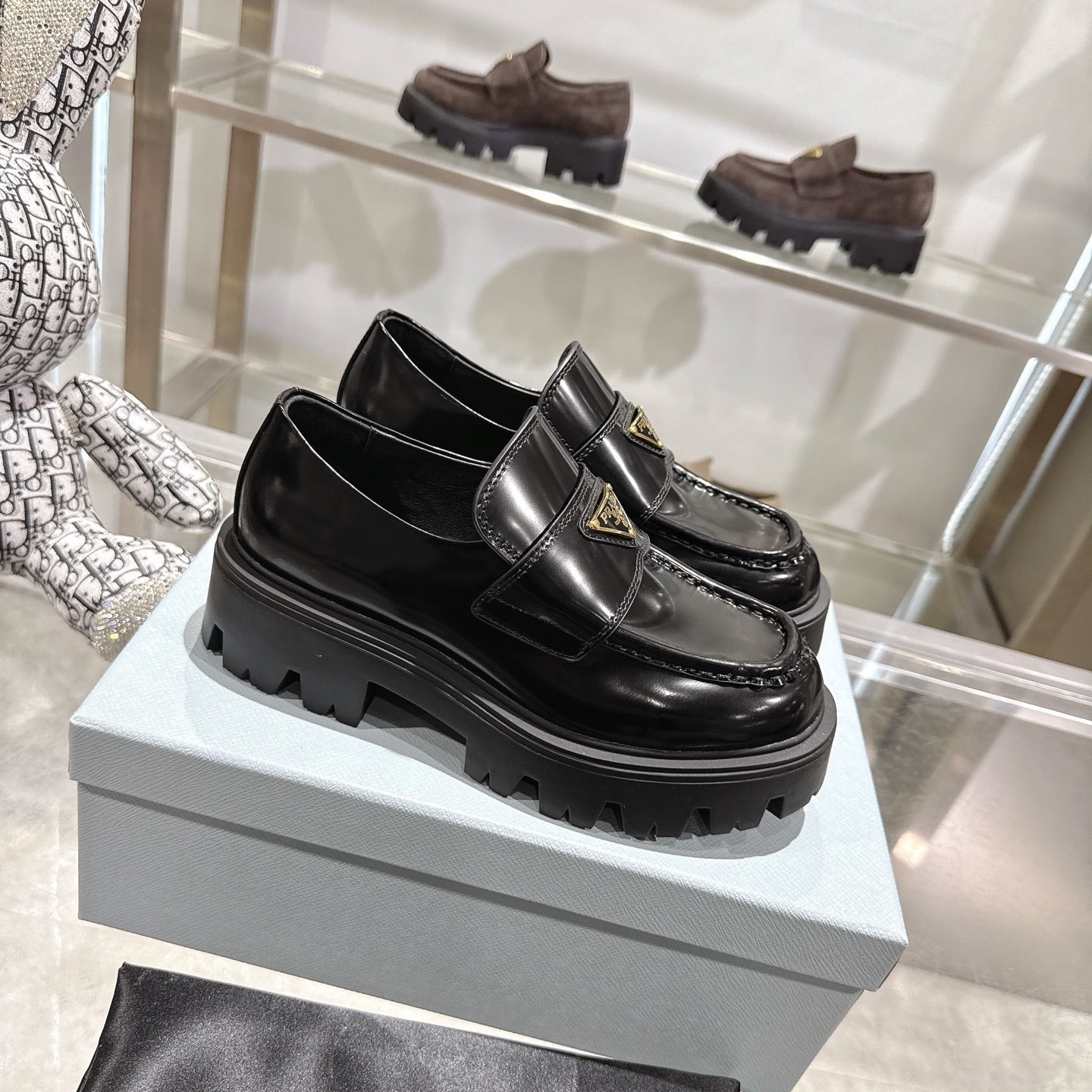 PRADA 25S THICK-SOLE LOAFERS 60 MM IN BLACK CALFSKIN - 35