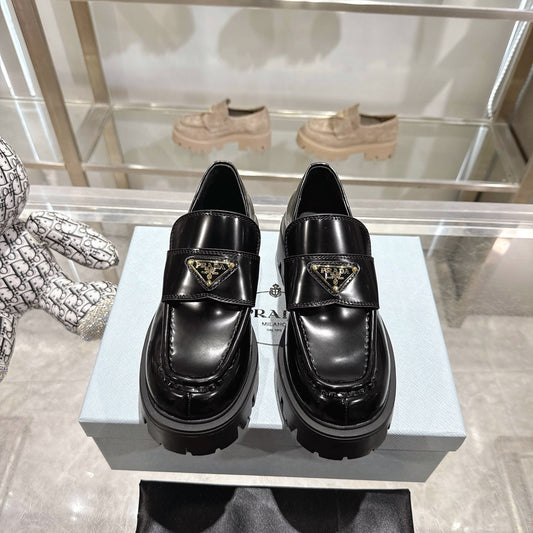 PRADA 25S THICK-SOLE LOAFERS 60 MM IN BLACK CALFSKIN - 35