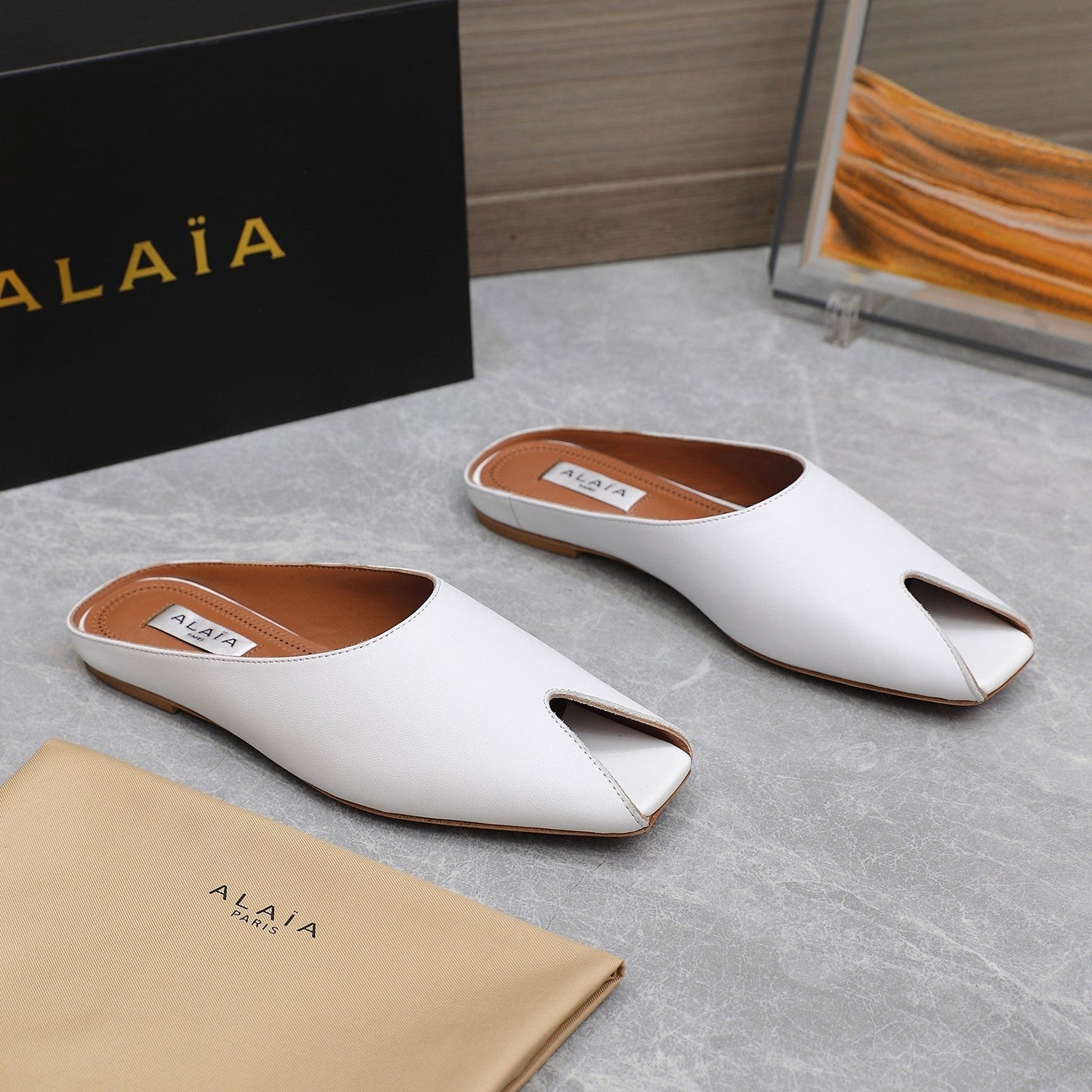 ALAIA FLAT MULE IN WHITE LAMBSKIN - 34