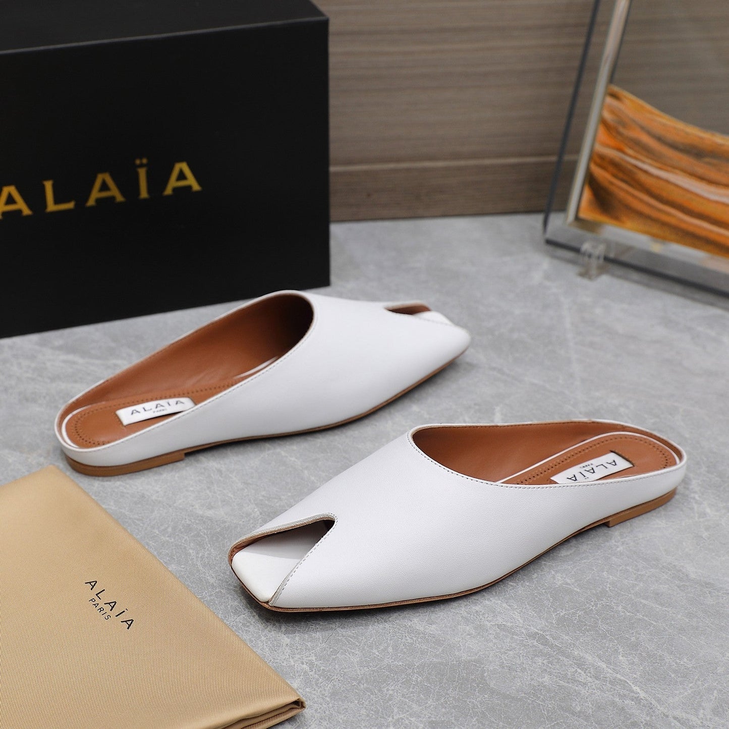 ALAIA FLAT MULE IN WHITE LAMBSKIN - 34