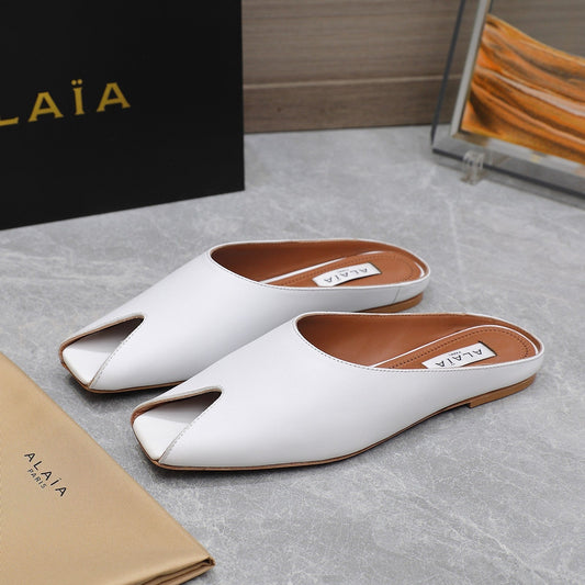 ALAIA FLAT MULE IN WHITE LAMBSKIN - 34