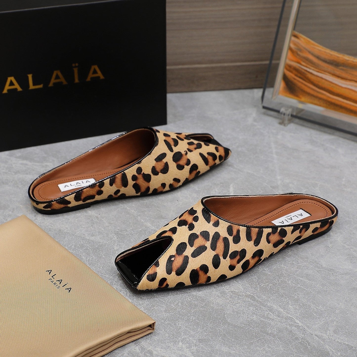 ALAIA FLAT MULE IN LEOPARD LAMBSKIN - 34