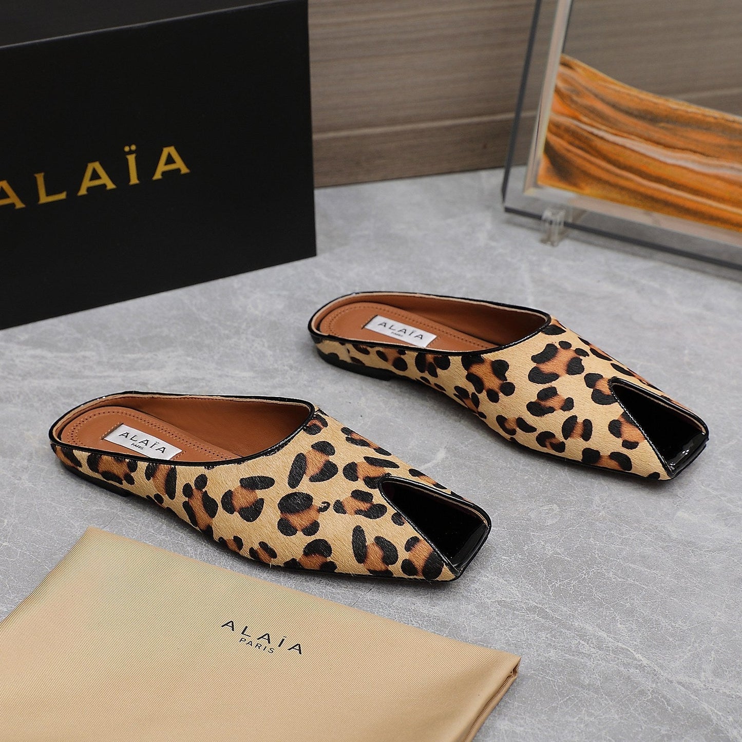 ALAIA FLAT MULE IN LEOPARD LAMBSKIN - 34