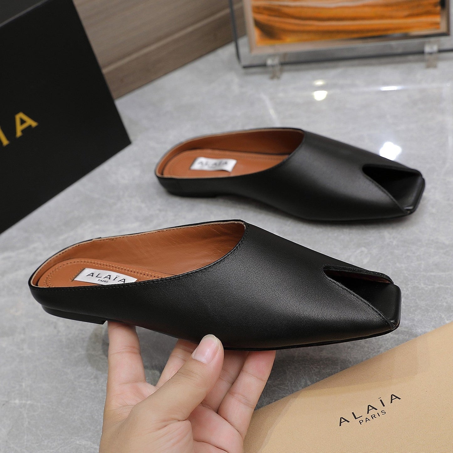 ALAIA FLAT MULE IN BLACK LAMBSKIN - 34